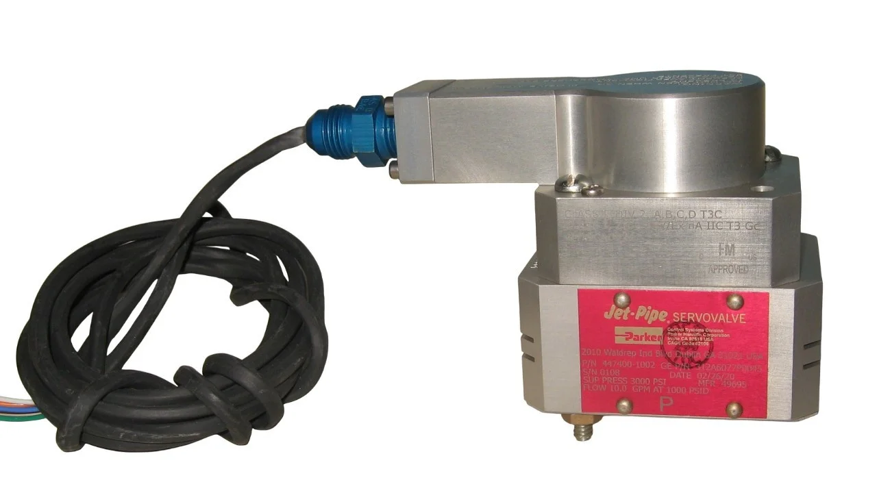 Abex 447400-1002 jet-pipe servovalve with silver aluminum body, blue connector, and red specifications label