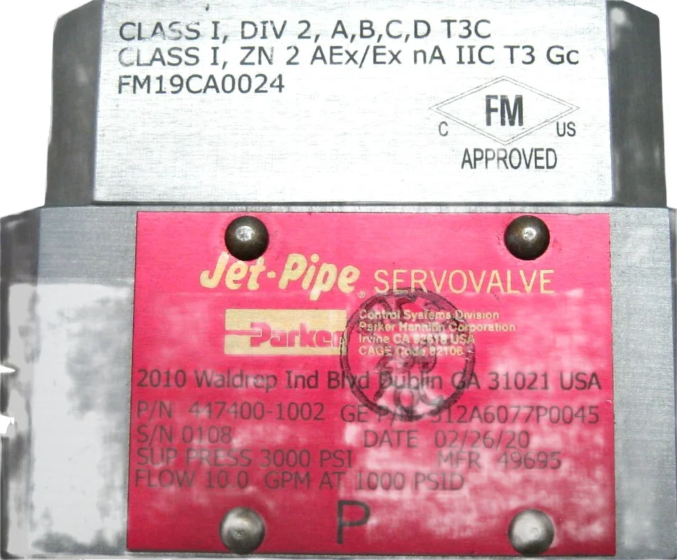 Abex 447400-1002 jet-pipe servovalve label showing 3000 PSI maximum pressure, 10 GPM flow rate at 1000 PSI, and FM marking