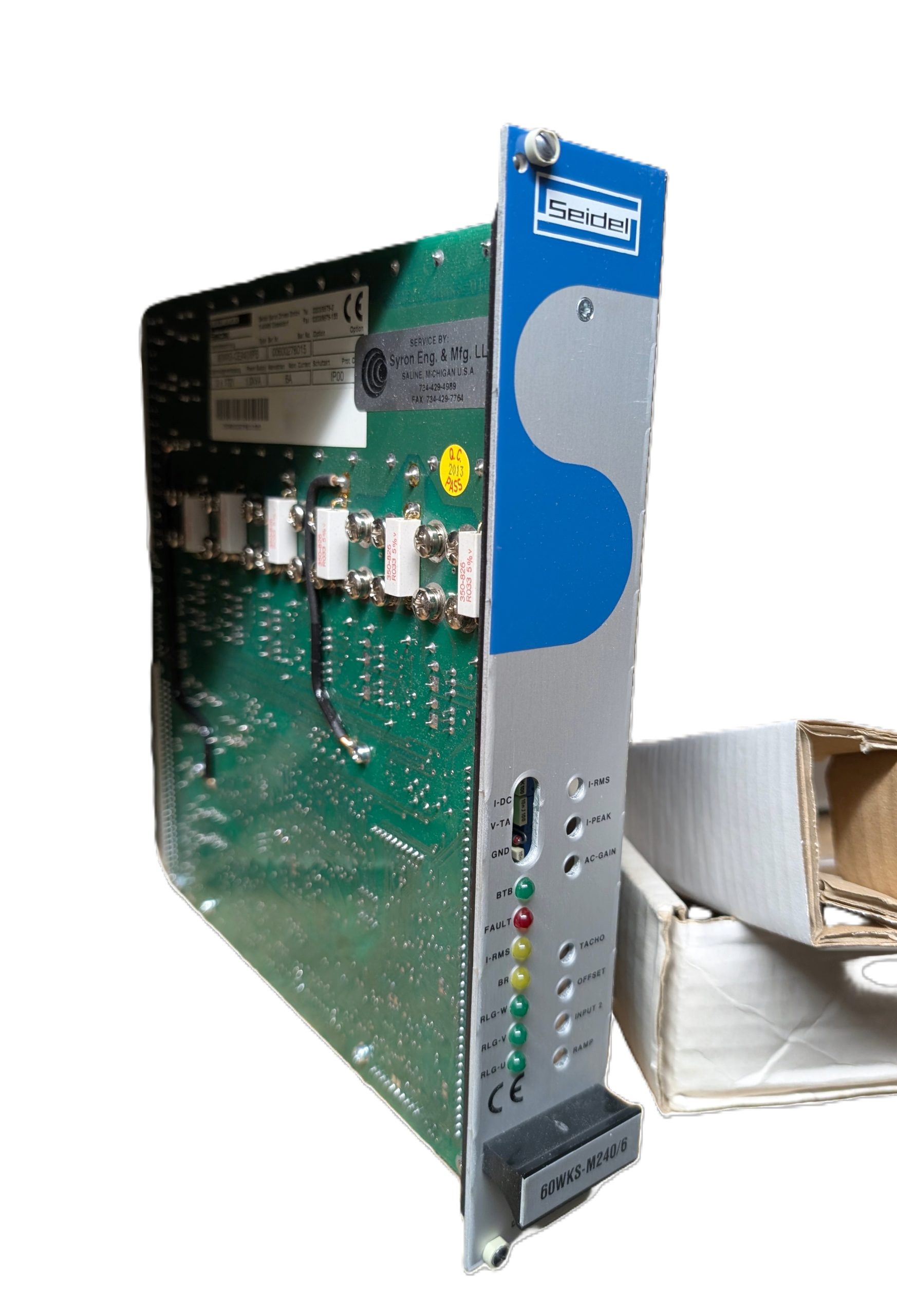 Kollmorgen Seidel 60WKS-M240/6 servo drive side profile showing exposed green PCB with white ceramic fuses, capacitors, and IC components